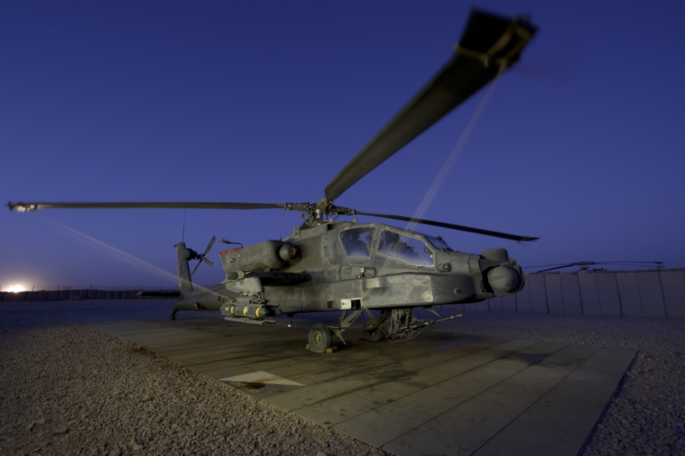 A US Army AH-64D Apache helicopter at Shindand Air Base Afghanistan Canvas Art - Stocktrek Images (35 x 23)