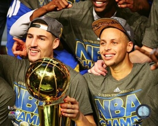 Klay Thompson & Stephen Curry with the NBA Championship Trophy Game 6 of the 2015 NBA Finals Sports Photo - Item # VARPFSAASB178
