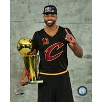 Tristan Thompson with the NBA Championship Trophy Game 7 of the 2016 NBA Finals Photo Print (16 x 20)